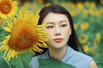 The girl in the sunflower garden