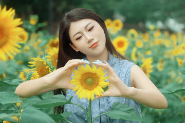 The girl in the sunflower garden