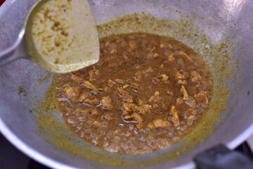Spicy stir fried pork with Cluster Bean (Bitter Bean or stink beans) popular southern Thai food, Stir fried Stinky Bean in Chili Paste with Pork