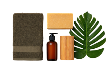 Spa arrangement with towel, soap, dispenser, wood, leaf, black
