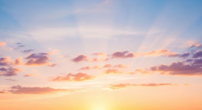 Dreamy sunset sky with pastel clouds creating a peaceful atmosphere, perfect for inspirational backgrounds and calming visuals for websites and social media projects