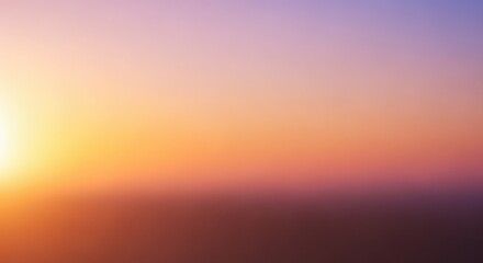 Vibrant sunset paints the sky with warm golden hues and soft purple gradients, creating a serene and breathtaking natural backdrop for peaceful reflection and inspiration.