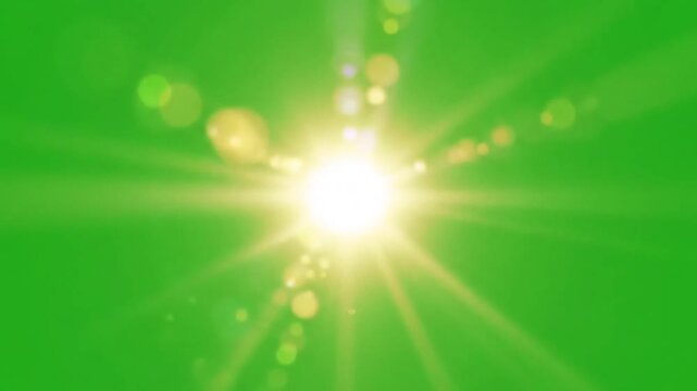 Bright sun light lens flare effect on a vibrant green screen background creating a dynamic and energetic visual for compositing and special effects in video production.