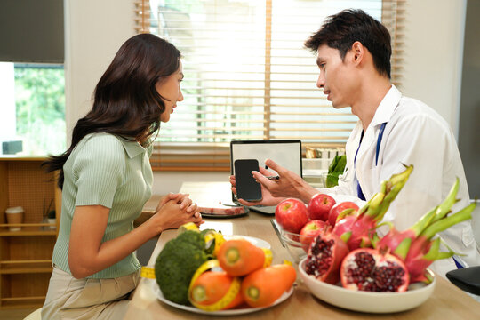 The healthcare professional providing nutritional guidance to a patient.