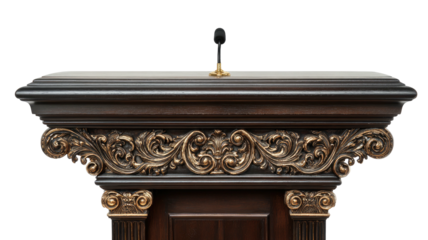 Ornate wooden podium with mic, dark wood and carved decorative trim