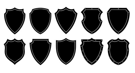 Collection of ten black heraldic shield shapes with distressed texture isolated on white background