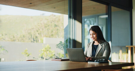 Remote work, woman and smile with laptop in home for editing manuscript, blog approval or feedback....