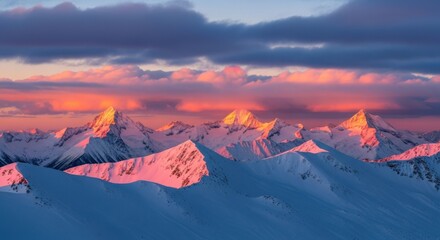 Majestic snow-covered mountain peaks illuminated by a vibrant sunset, showcasing dramatic clouds and a breathtaking natural landscape with serene beauty and tranquility