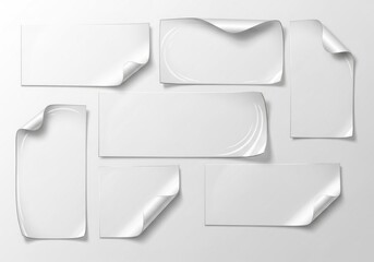 Blank white sheets with curled corners, customizable design set.