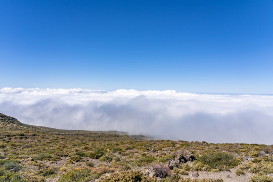 Temperature inversion. Leleiwi Overlook Trail, Haleakalā National Park, Maui, Hawaii. A sea of clouds is an overcast layer of stratocumulus clouds.

