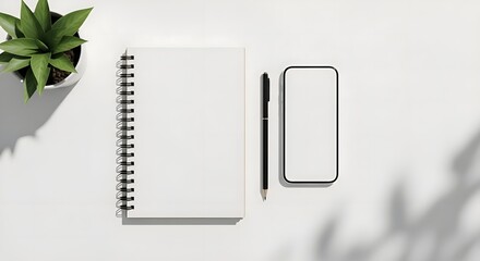 Minimalist top-down view of a bright workspace with a blank notebook, smartphone, pen, and green plant, perfect for productivity, study, or showcasing design concepts