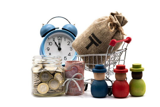 5,000 Kazakhstani tenge banknotes and a glass jar with 100 Kazakhstani tenge coins