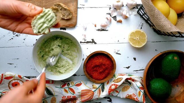 Millennial breakfast, healthy food, low fat, easy to make, just with fresh avocado bread slices and vegetables. Cinematic 4k 60 Fps video footage