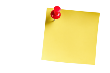 Yellow sticky note with red pushpin on black background paper reminder
