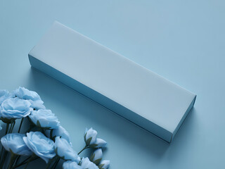 Light blue gift box adorned with delicate roses on soft pastel background