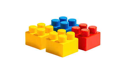 Three colorful building blocks isolated on a black background