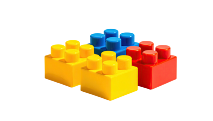 Three colorful building blocks isolated on a black background