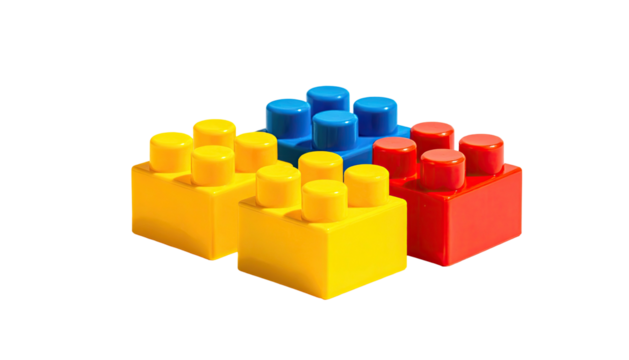 Three colorful building blocks isolated on a black background
