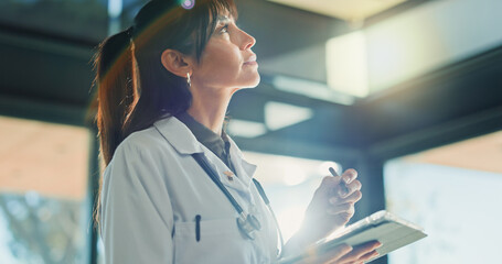 Idea, medical and tablet with doctor woman in hospital for diagnosis results, feedback or planning....