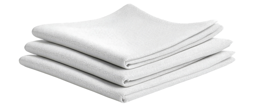 A stack of neatly folded white linens on a clean surface, creating a serene and organized atmosphere, ideal for showcasing home textiles in a minimalist setting