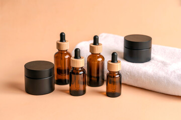 Amber Glass Cosmetic Bottles and Jars on Beige Background Natural Skincare Concept