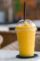 Healthy concept of drink through refreshing mango smoothies