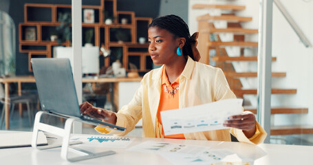 Black woman, typing and laptop with document at house for research, finance report and stats....