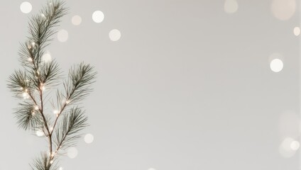 Minimalist Christmas Pine Branch with Bokeh Lights.