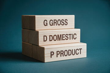 Gross domestic product or GDP concept on wooden blocks showing each word representing the economic indicator