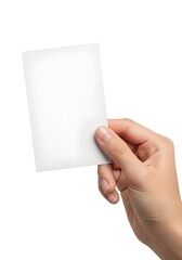 Female hand holding a blank vertical business card or flyer mockup. Isolated on white background.