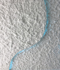 A blue line is drawn on a white background