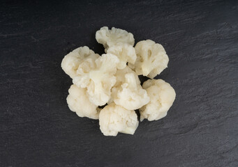 Steamed cauliflower pieces close up