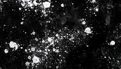 Abstract black background with white paint splatter texture artistic design