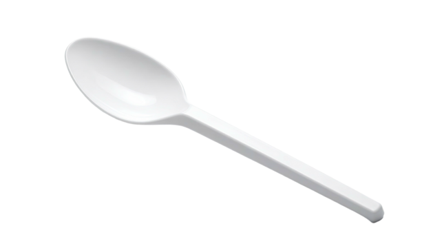 White plastic spoon diagonally oriented on a black background