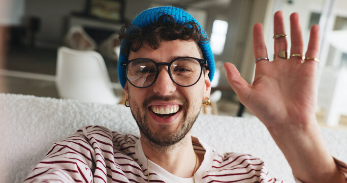 Portrait, man and wave for vlog, home and greeting fans on social media, happy and content creation. Hello, online and person with smile for video POV on website, influencer and live streaming in USA