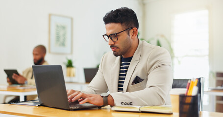 Typing, business man and laptop in office for editing press release, monitor news coverage or...
