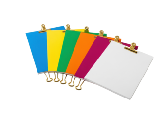 Six perfectly cut, smooth cardstock sheets in vibrant blue, yellow, green, orange, magenta, white, with brass clips on a transparent background, concept of creative design potential