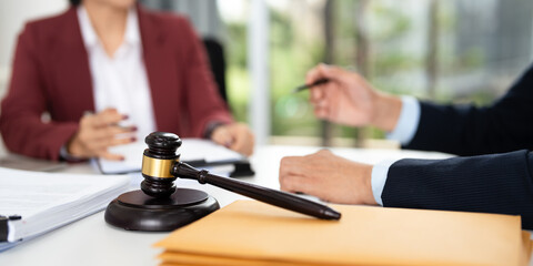 Two Lawyer discuss the terms of the contract. Concept of legal advice and business decision-making.