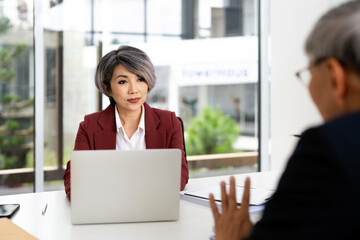 Two Lawyer discuss the terms of the contract. Concept of legal advice and business decision-making.