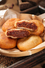 Handmade Chinese Jiangmai Bean Paste Cakes in Bamboo Basket Traditional Asian Dessert