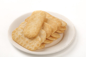 Crispy Rice Crackers and Scallop Snacks on White Plate Asian Food Photography
