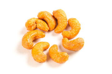 Roasted Vietnamese Salt-Baked Cashews with Golden Crispy Coating on White Background