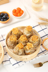 Handmade Siu Mai Dim Sum Dumplings with Fish Roe in Bamboo Steamer - Traditional Chinese Food