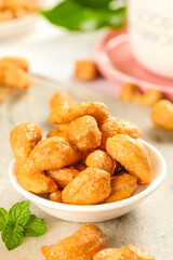 Salted Vietnamese Cashews in Bowl with Mint - Golden Amber Nuts Healthy Snack Food Photography