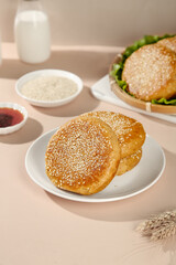 Traditional Beijing Sesame Seed Cakes - Golden Roasted Chinese Sweet Pastries with Sauce