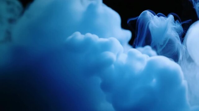 Mystical blue smoke swirls against a dark background