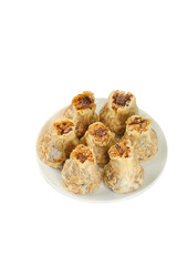 Handmade Pork Shumai Dumplings with Pearl Topping on White Plate - Traditional Chinese Dim Sum