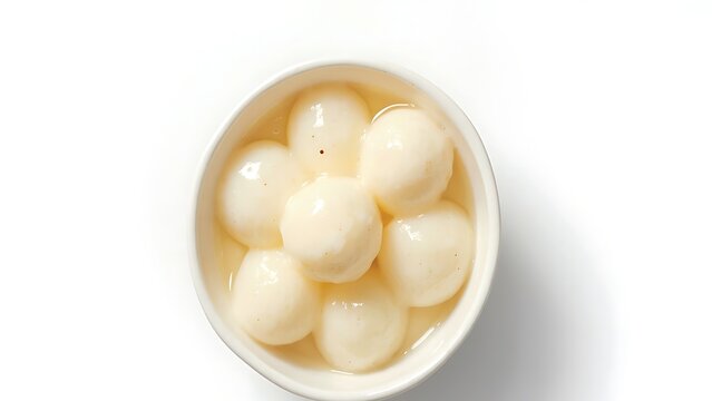 Top-down view of white Indian Bengali sweet dessert Rasgulla in a bowl