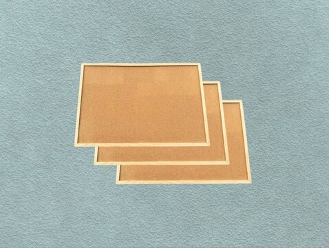 The green background in the image is a brown sticky whiteboard with sturdy edges, used for hanging or placing pins to show work on the board from soft brown wood, soft wood texture Beautiful.