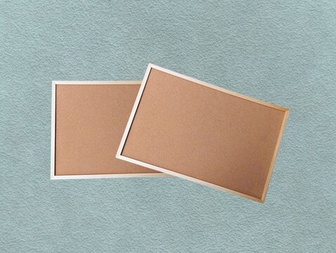 The green background in the image is a brown sticky whiteboard with sturdy edges, used for hanging or placing pins to show work on the board from soft brown wood, soft wood texture Beautiful.